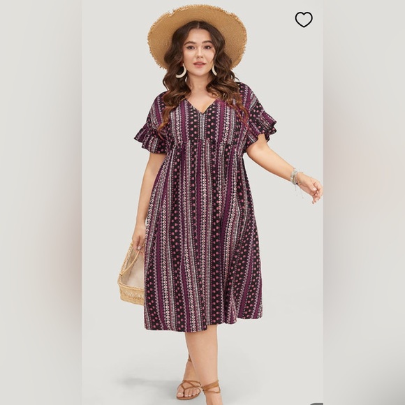 Bohemian fun! Comfortable dress w/ dolman set sleeves & ruffles to cap them off. - Picture 1 of 2